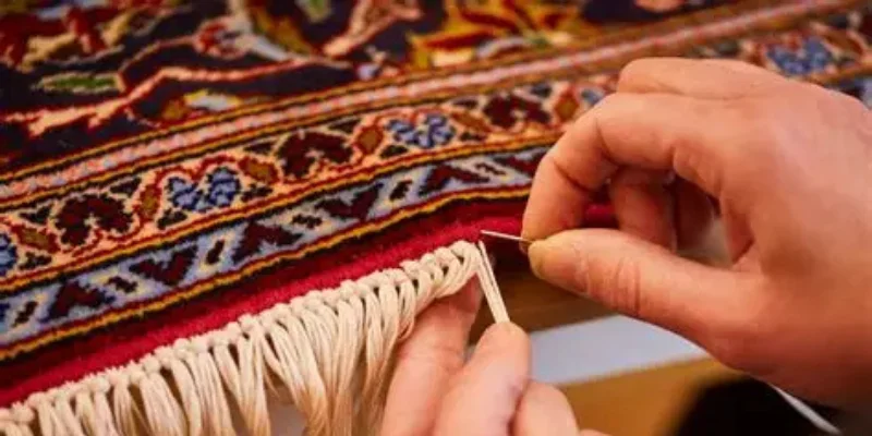 Wicker chair on blue rug