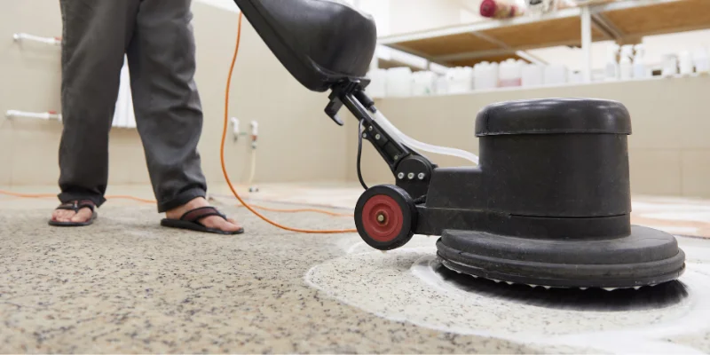 Wicker chair on blue rug