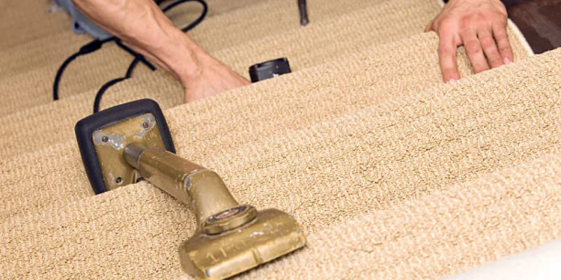 Wicker chair on blue rug