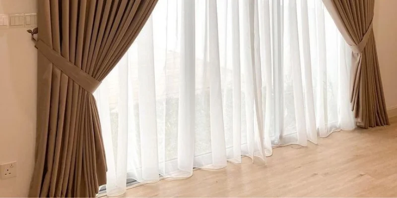 Wicker chair on blue rug