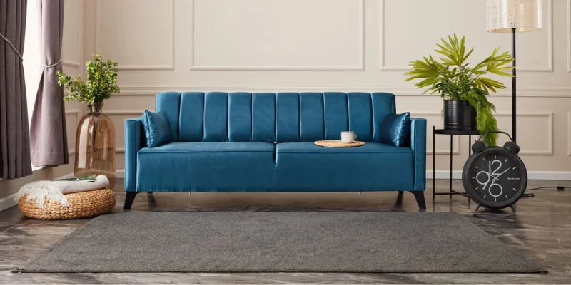 Wicker chair on blue rug